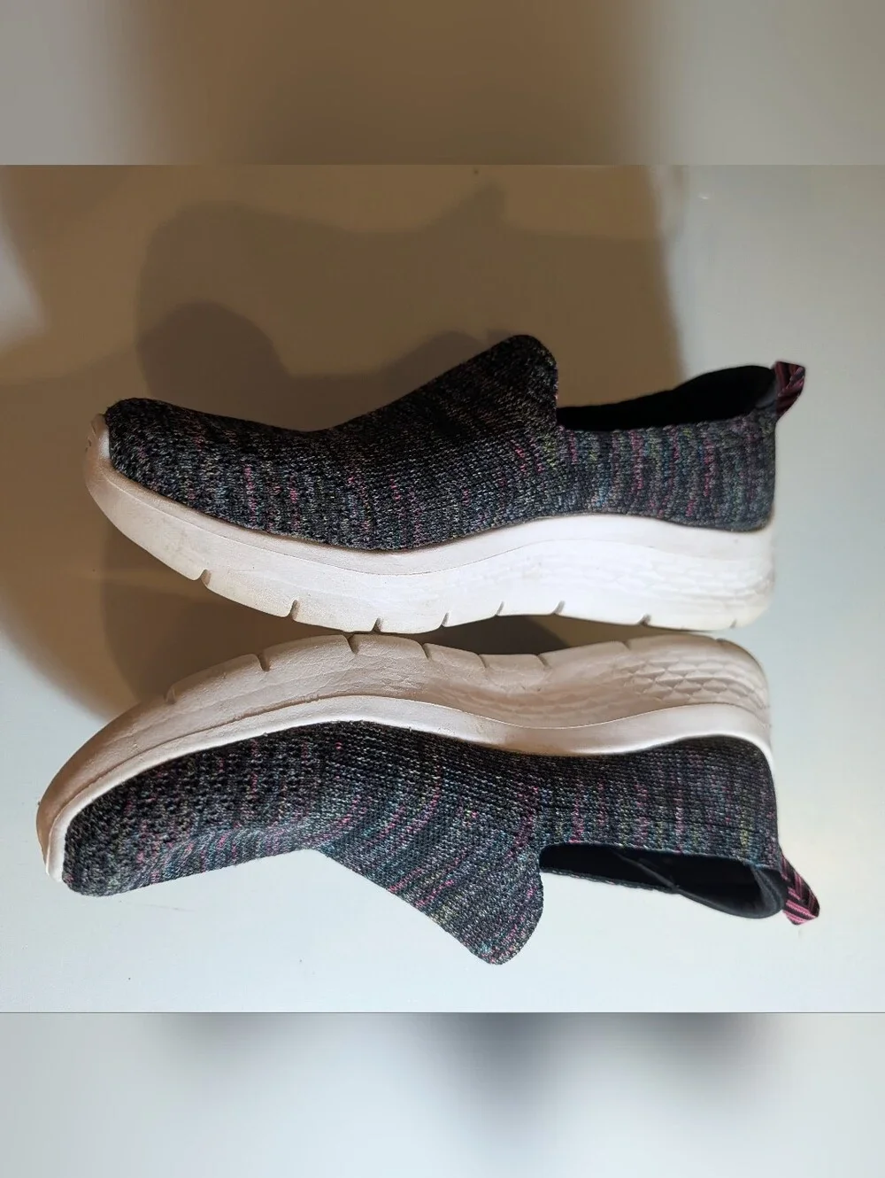 Skechers Slip-On Knit Sneakers in Black with Pink Accents